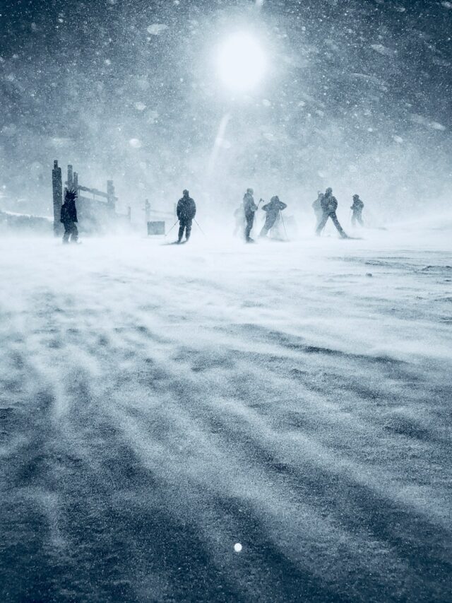 people walking during snow