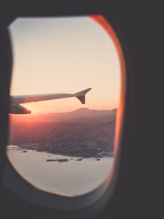 person riding airplane photography