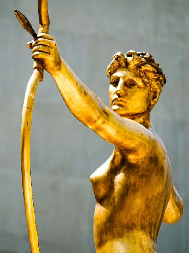 female with arrow statue