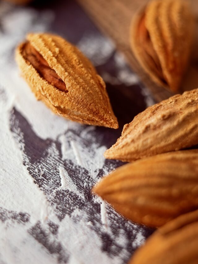 a close up of some almonds on a table