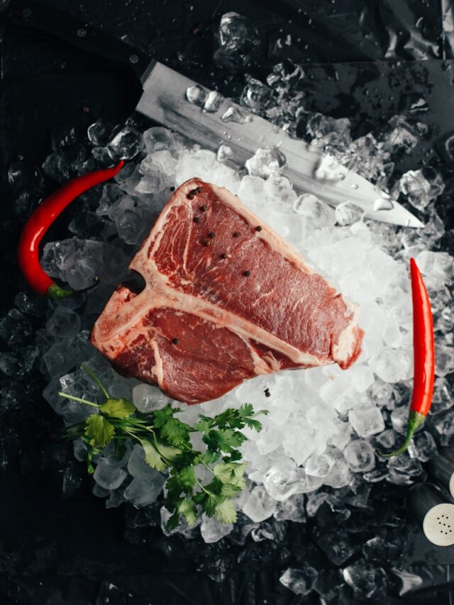 raw meat on ice with coriander and chilis